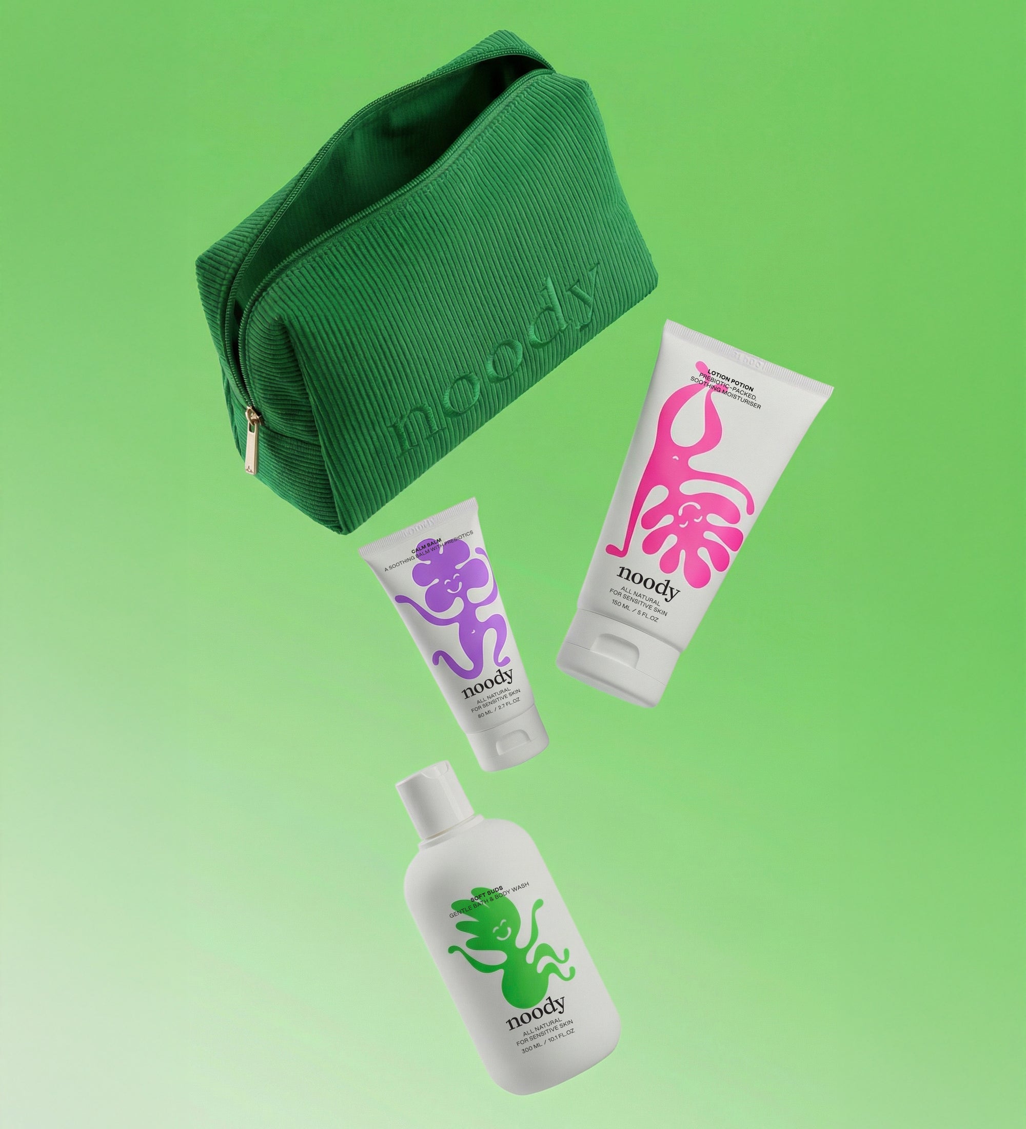 Noody Happy Skin Set — three products (Soft Suds, Lotion Potion, Calm Balm) in a green corduroy travel bag. Made in Aotearoa.